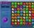 Bejeweled Deluxe Demo - Your goal is to match at least three jewels of the same color.